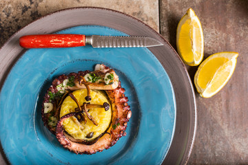 Grilled Seafood Octopus on Saffron Risotto with Brown Shimeji Mushrooms