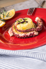 Grilled Seafood Octopus on Saffron Risotto with Brown Shimeji Mushrooms