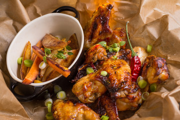 Spicy Chicken Wings with Hot Chili Jam, Baked Potatoes and Purple Carrots