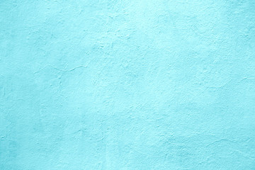 concrete wall of light blue color, texture turquoise cement background