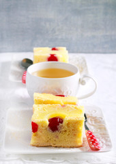 Pineapple and cherry cake, sliced