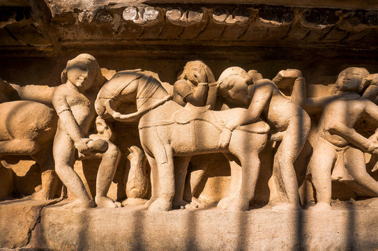 Famous erotic stone carving bas relieves, Lakshmana Temple, Khajuraho, India.