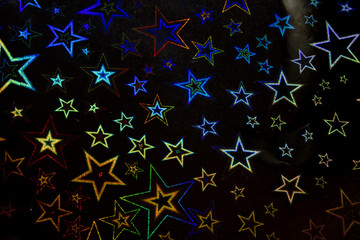 Holographic Stars on Black Background
