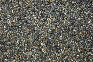 The texture of asphalt with small stones
