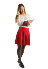 Cute young student girl with books