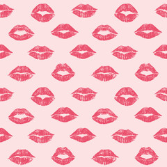 Female lips hearts seamless pattern