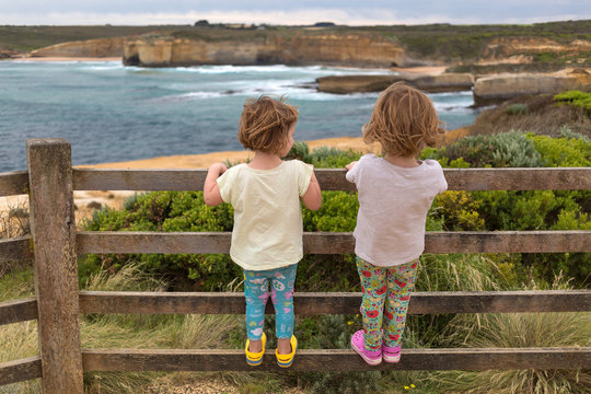 Kids looking at view, Great Ocean Road, Australia
