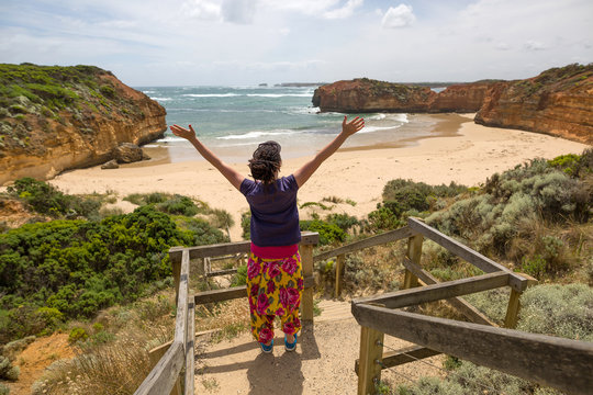 Woman enjoying her freedom with open arms, Australia
