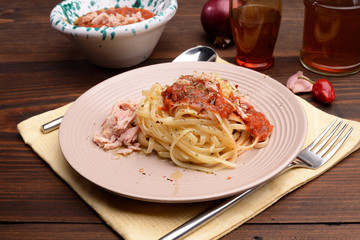 fettuccine dish with sauce with tuna and red pepper