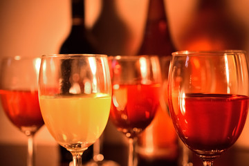 Colorful wine glass with wine in a bar