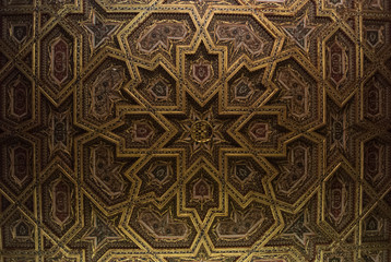 TOLEDO, SPAIN - FEBRUARY 8, 2017: A ceiling of the Primate Cathedral of Saint Mary of Toledo, decorated with dragons' heads and stars, Castilla-La Mancha, Spain.