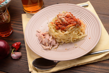 fettuccine dish with sauce with tuna and red pepper