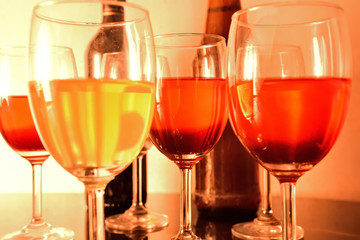 Colorful wine glass with wine in a bar