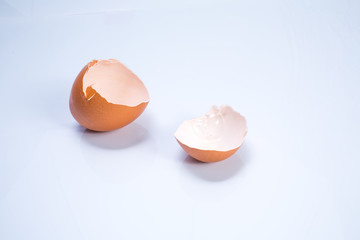 Cracked egg shells isolated on white background
