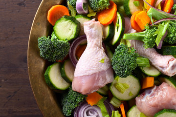  raw vegetables with chicken drumsticks