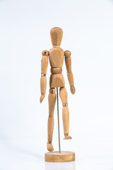 Wooden figure stand isolated on white background