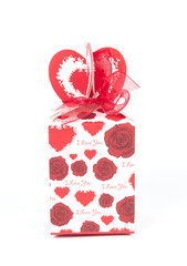 red gift box, with ribbon and Christmas decoration