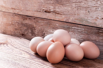 Pile of eggs on an old board