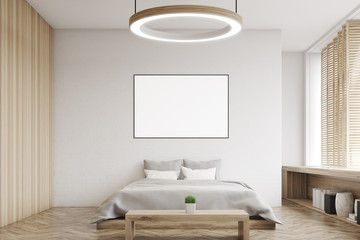 Bedroom with round lamp, front