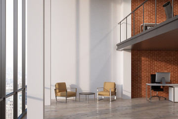 Office waiting area with armchairs
