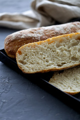 Fresh Italian bread on a cutting board