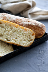 Fresh Italian bread on a cutting board