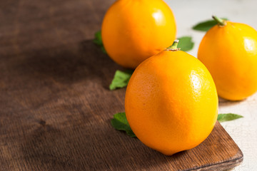 Ripe organic lemons on the kitchen's table