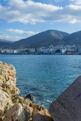 Blue sea in the harbor against the backdrop of the mountains, Hersonissos, Greece