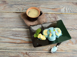 The elephant is made of ice cream. A creative dessert for children and good mood.