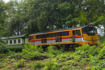 Obraz premium Train rides on Burma railway in Kanchanaburi province, Thailand, Railway was built by Japan in 1943, to support its forces in World War II.