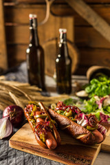 French sandwich with green and sausage on vintage background