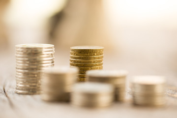 Coins stacking in warm tone color