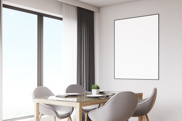 Close up of kitchen table and poster