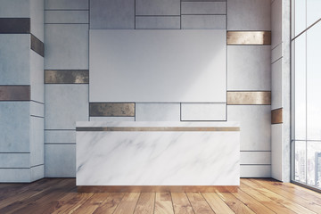 Marble reception and a poster