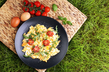 Traditional breakfast - fried eggs,ruccola, tommato- - diet concept scrambled eggs