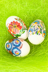 Easter eggs on green like grass background
