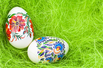 Easter eggs on green like grass background