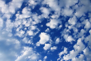 Summer blue sky with small white clouds