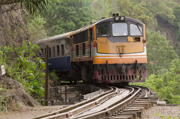 Fototapeta na wymiar Moving train at death railway, Kanchanaburi, Thailand