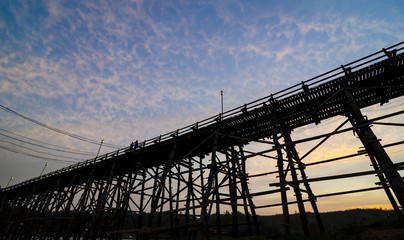 sunset at The longest wooden bridge and floating Town in Sangklaburi Kanchanaburi Thailand