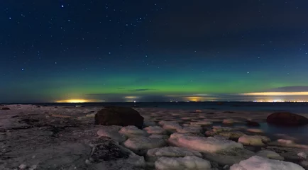 Fototapeten Polarkreis Aurora borealis. Northern Lights. Polar lights and ice floes. Ladoga. Russia St. Petersburg.  © mono2mono