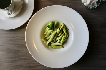 Photo of a bright green pasta