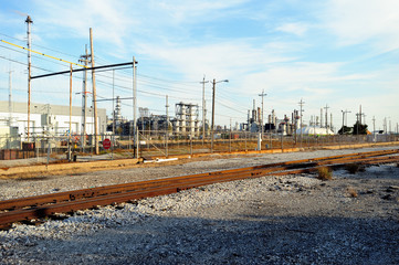 Fototapeta na wymiar Railroad tracks and sidings along a steel mill in Whiting, Indiana. The mills are significant users of rail service for the transportation of both raw materials and finished product.