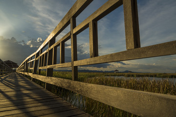 Wooden bridge over a lake in Sam Roi Yod National Park, Prachuap Khiri Khan, Thailand
