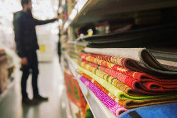 A man chooses carpet