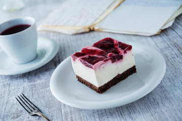 Delicious and sweet cheesecake with cherry jelly