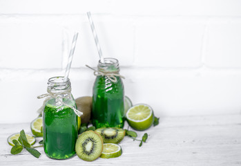 green smoothie on white background