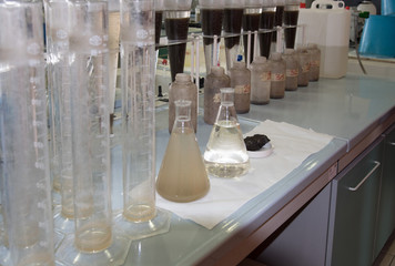 several containers with water to clean up