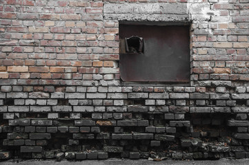  darkness in an old ruined brick wall