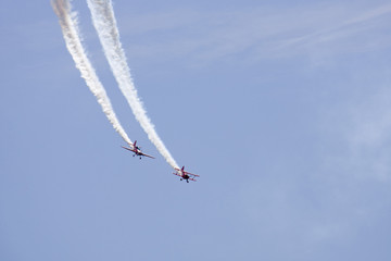 Two planes performing in an air show